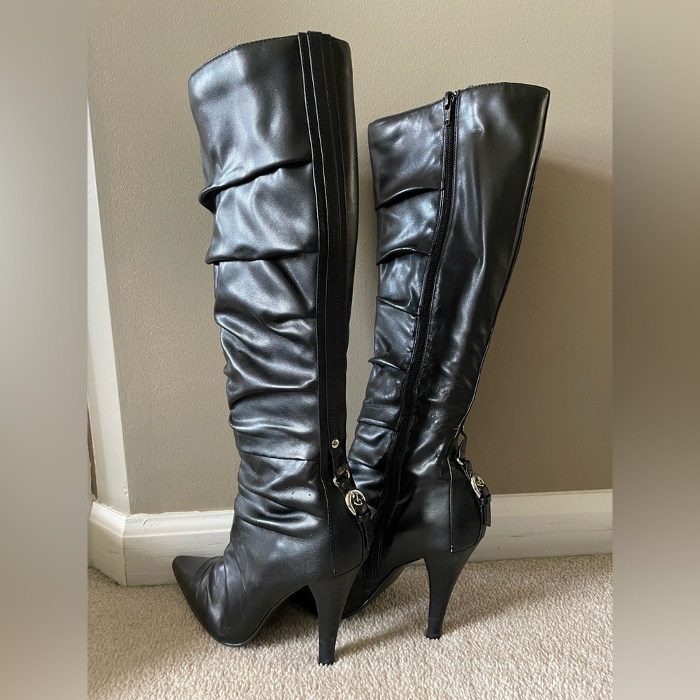 Knee high faux leather boots.
